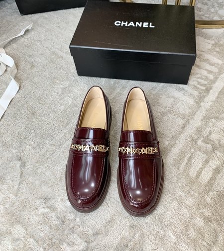 Chanel metal letter loafers